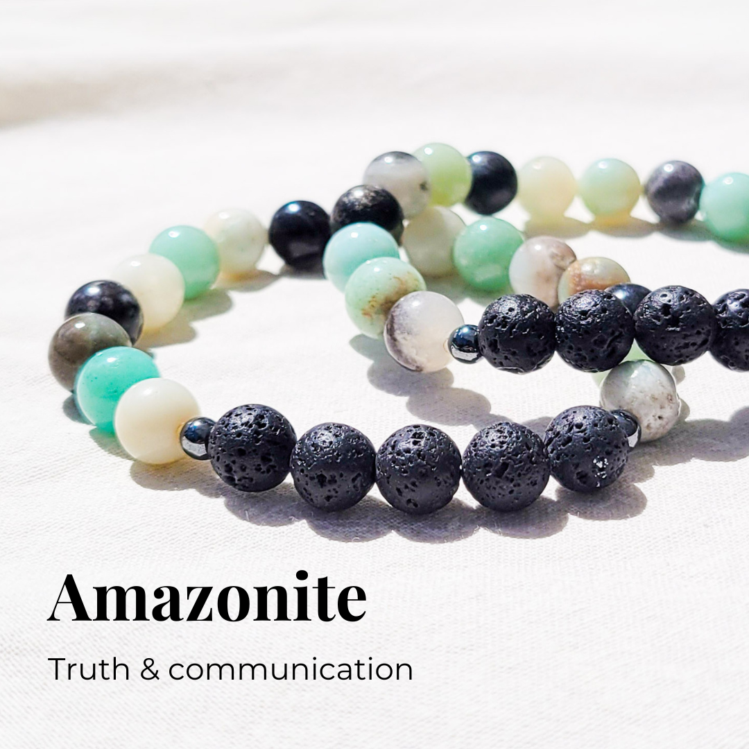 Mixed color amazonite diffuser bracelet with black lava stones and silver hematite spacers for essential oil diffusion.
