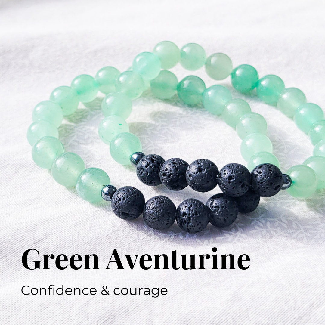 Green aventurine diffuser bracelet with black lava stones and silver hematite spacers for essential oil diffusion.
